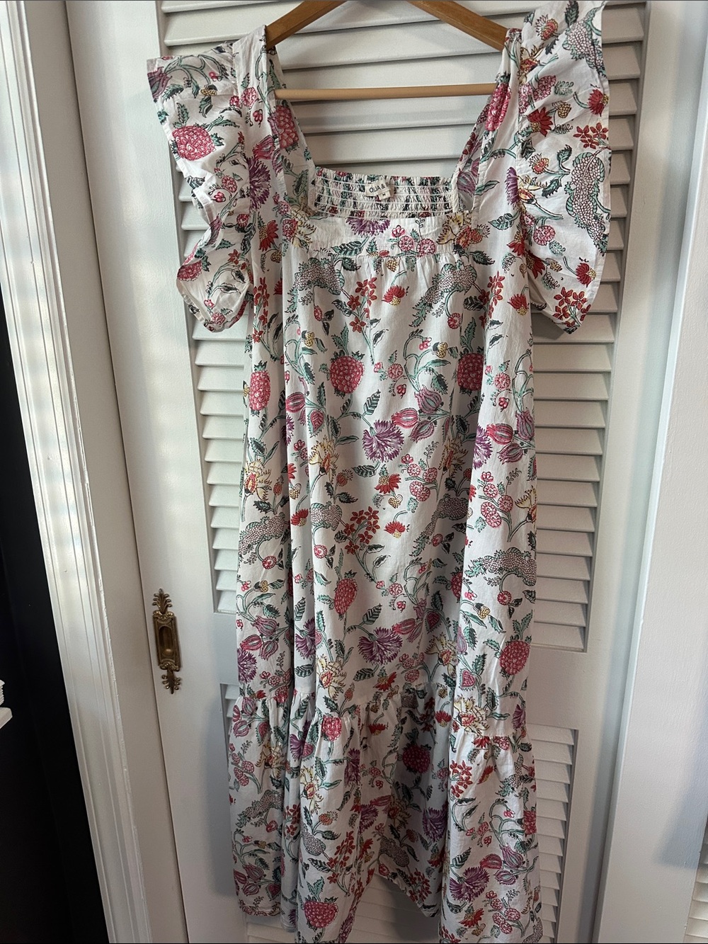 Beautiful Floral White Cotton Maxi Dress with Ruffle Sleeves and hem.